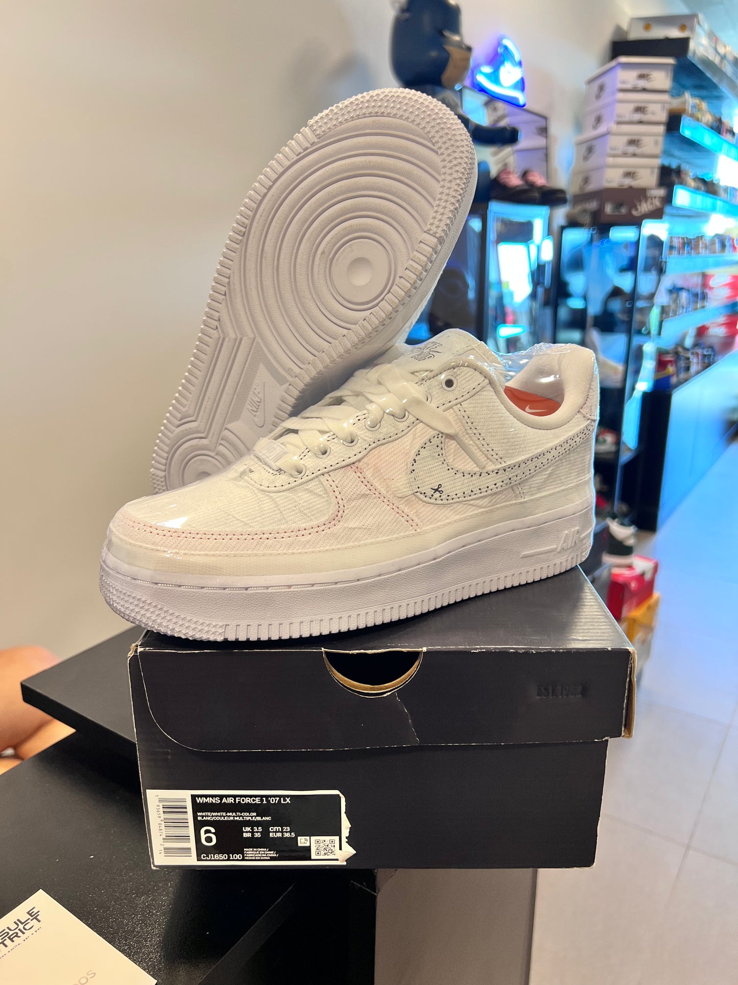 Nike Air Force 1 LX
Reveal Black Swoosh (Women's)